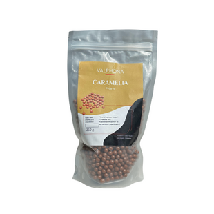 Кульки хрусткі у молочному шоколаді Caramelia 36% Valrhona 250 г 8425/250 фото