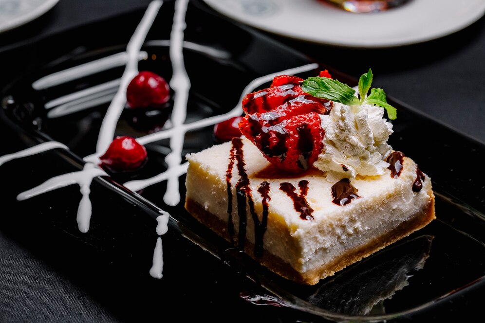 cheesecake with strawberry cream jam cherry side view 141793 3079