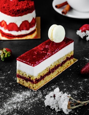 square slice strawberry cheesecake with white macaron top 114579 2987