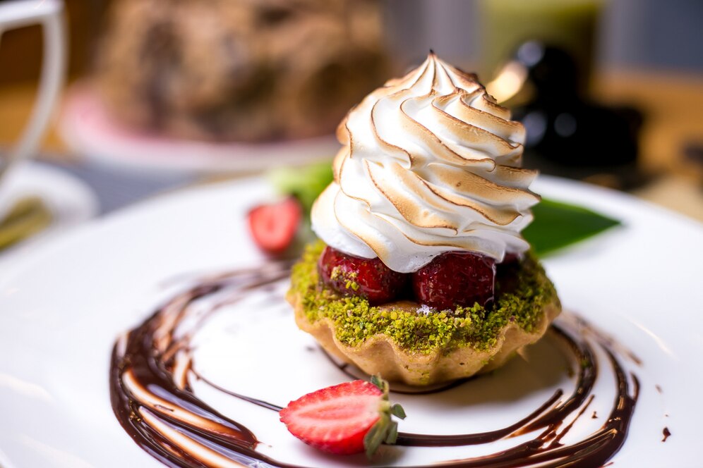 tartlets-with-pistachios-strawberry-cream-chocolate-side-view_141793-4154.jpg